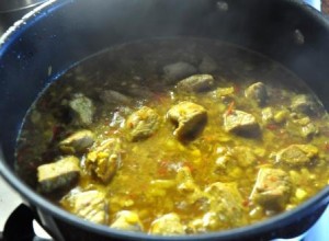 Pork simmering in the pan with curry sauce