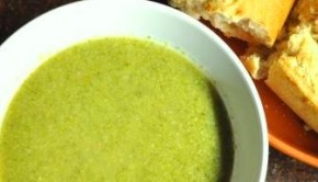 Bowl of homemade broccoli soup and fresh bread