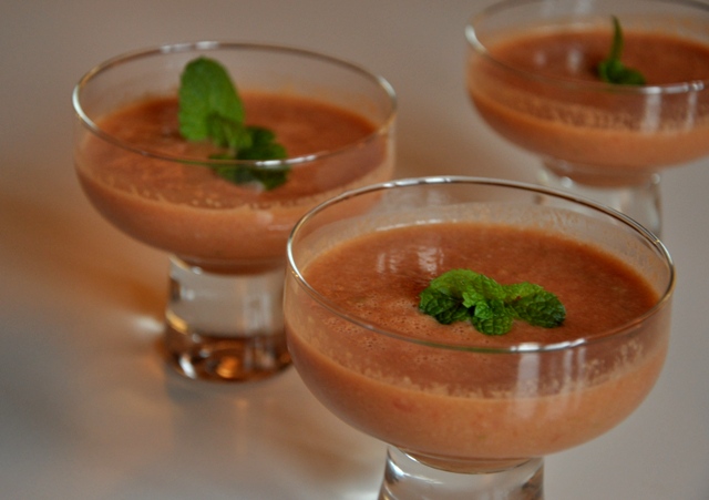 Gazpacho with mint in glass bowls