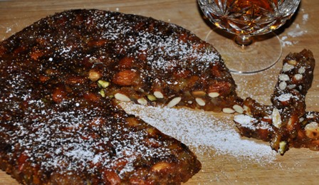 An image of fresh panforte on the chopping board