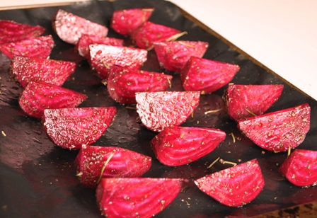 AN image of beetroot wedges, trayed up for the oven