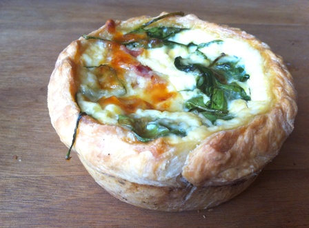 An image of bacon and spinach quiche