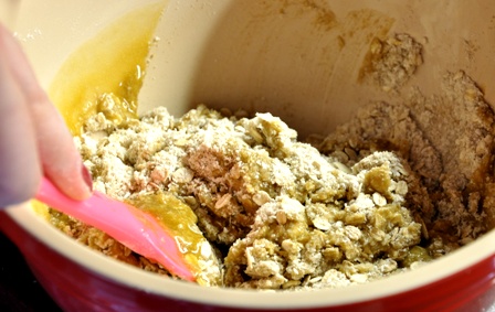 An image of ingredients for Anzac biscuits being mixed