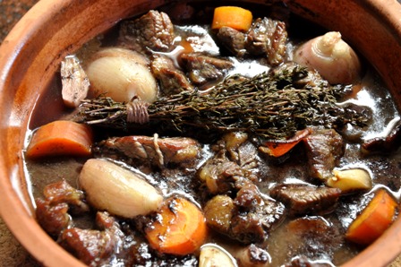An image of beef bourguignon in the pot
