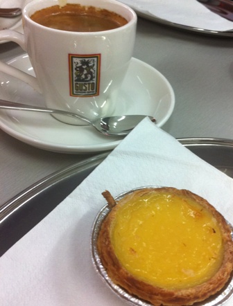An image of custard tart and coffee