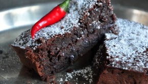 An image of beetroot and chilli chcolate brownies on a metal plate