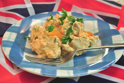 An image of coronation chicken surrounded by bunting flags