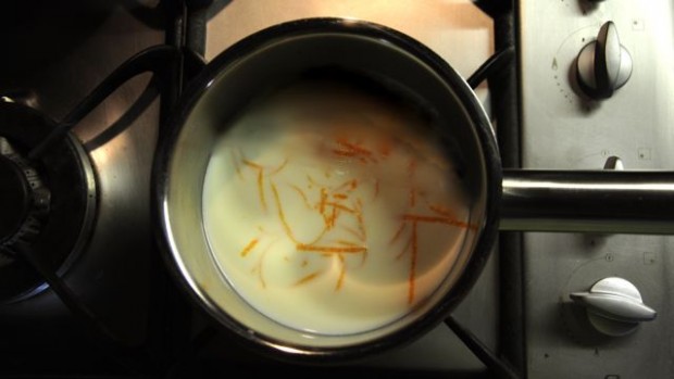 An image of orange zest infusing milk