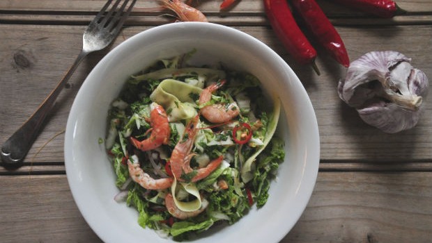 Spicy Vietnamese style salad in a bowl with green mango