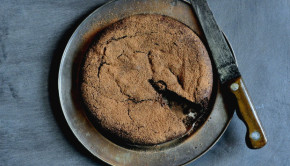 Flourless chocolate cake on a metal plate