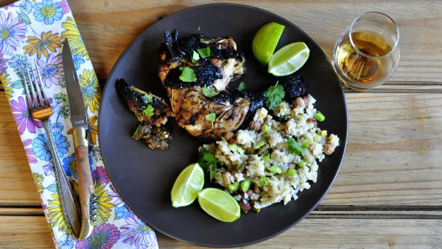 Perfect juicy, crispy, spicy jerk chicken on a plate